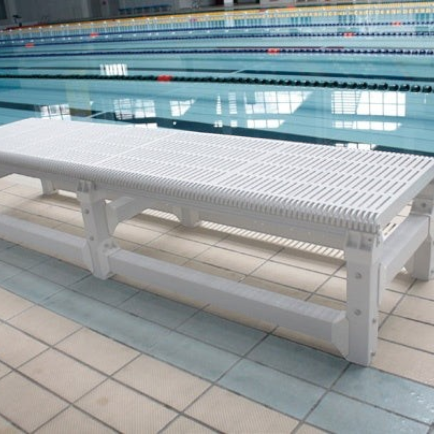 Tali Sport white foldable swimming pool platform with a slatted surface for water flow, placed on a pool deck.-2/7 