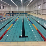Tali Sport swimming pool lane ropes with colorful floating buoys installed in an indoor competition pool 