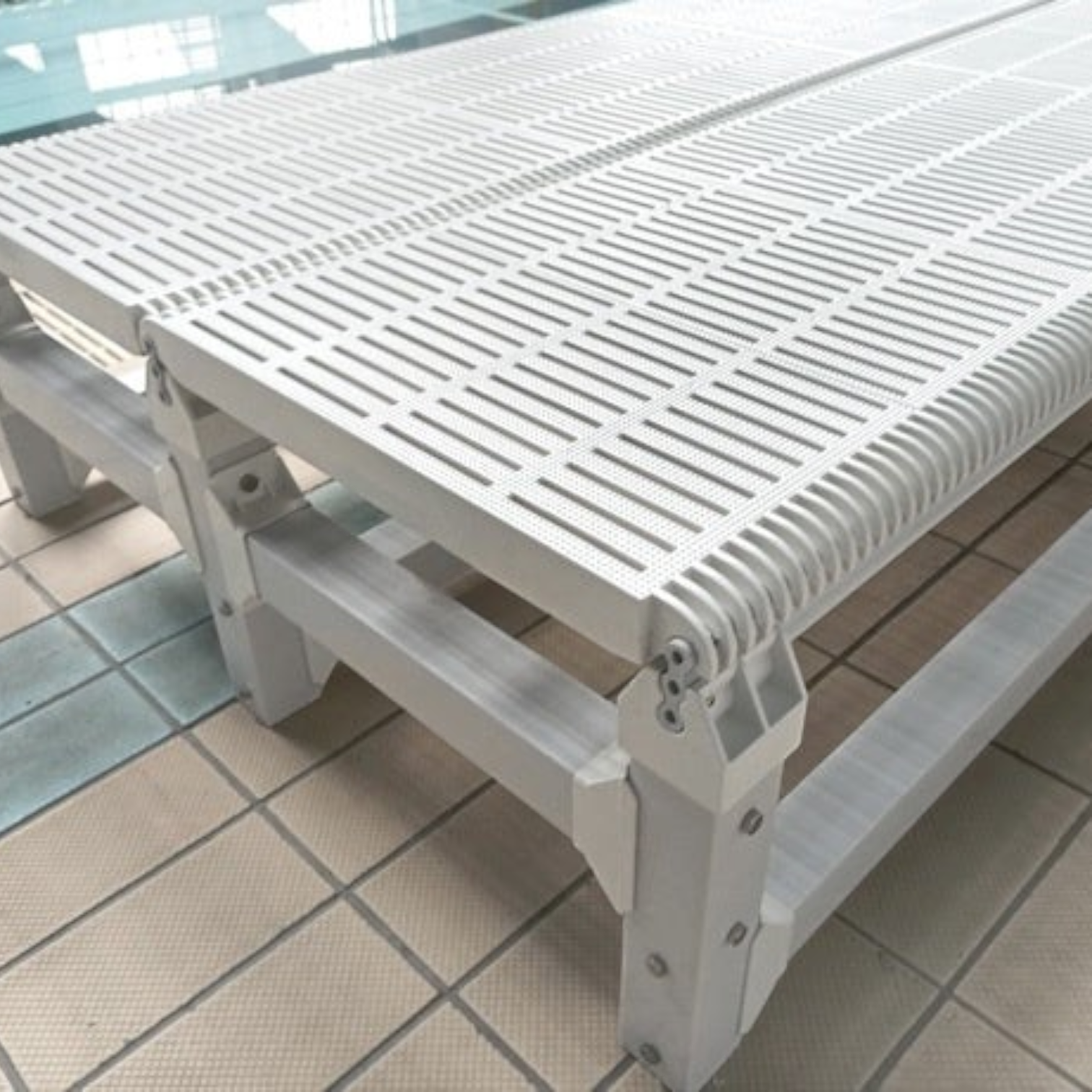 Tali Sport white foldable swimming pool platform with a slatted surface for water flow, used for swim training.-5/7 