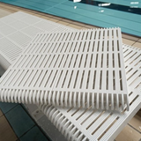 Tali Sport white foldable swimming pool platform with a slatted surface for water flow, used for swim training. 