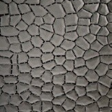 Tali Sport modular grey PVC non-slip pool mat with a textured stone-like pattern for safety in wet areas. 