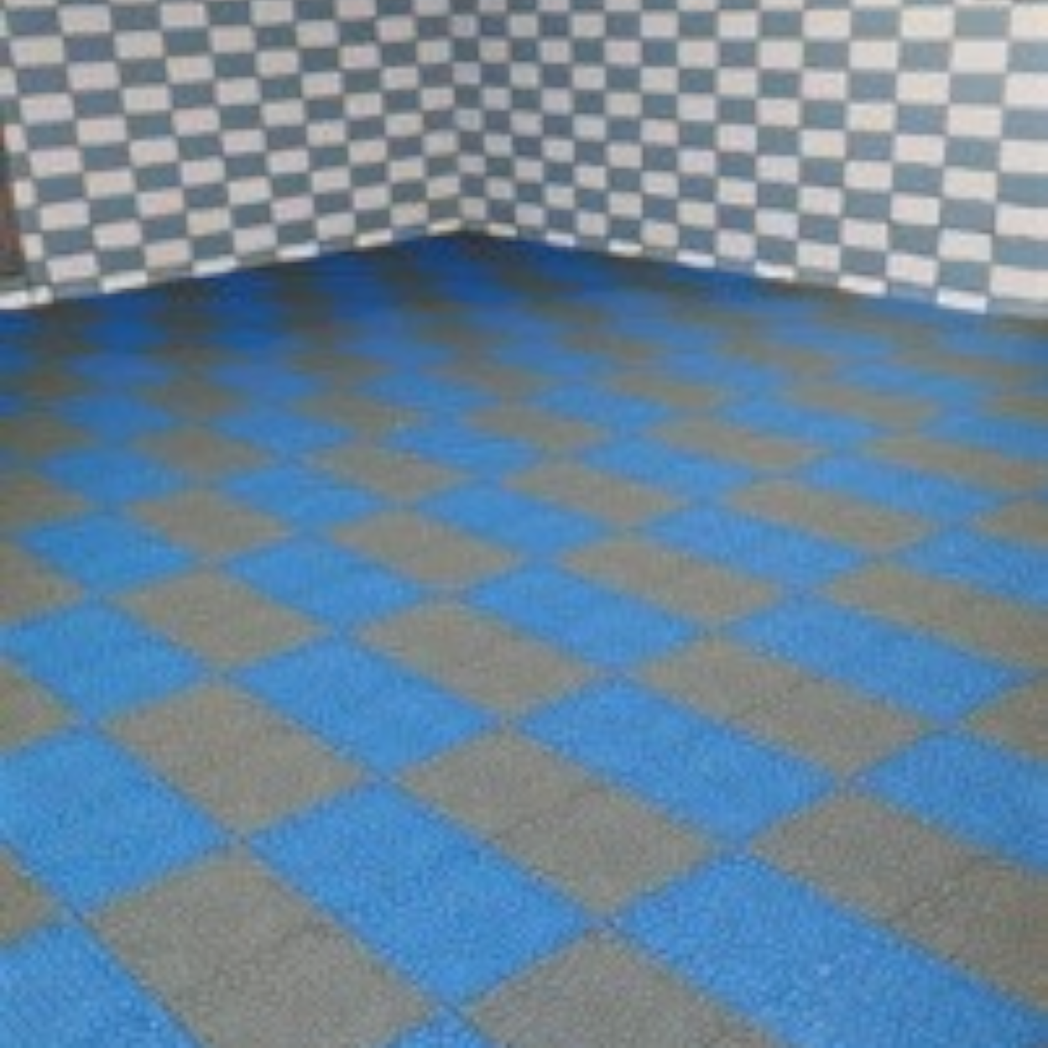 Tali Sport modular anti-slip PVC floor tiles in a blue and grey checkered pattern for pool and shower areas-11/14 